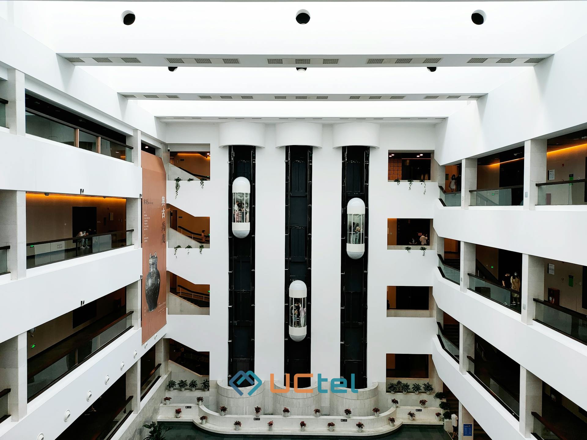 Spacious corporate lobby with modern design and glass architecture