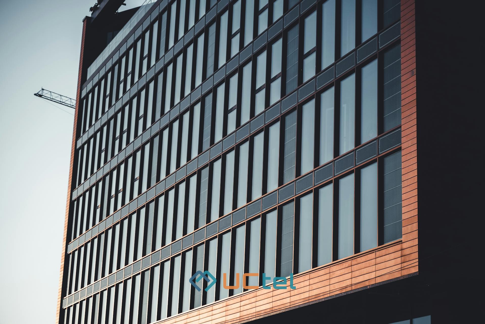 Modern office building exterior representing a business site with mobile connectivity needs