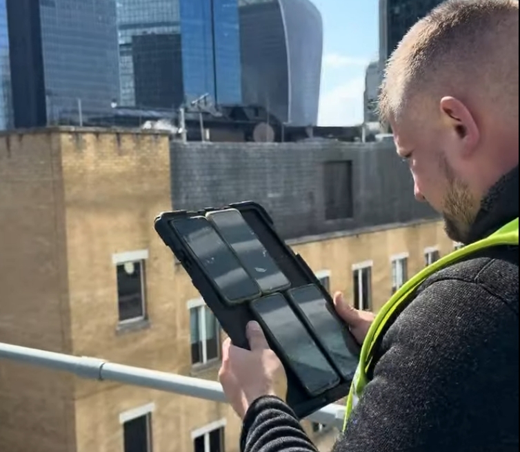 UCtel engineer conducting on-site survey and producing final design for mobile signal booster installation